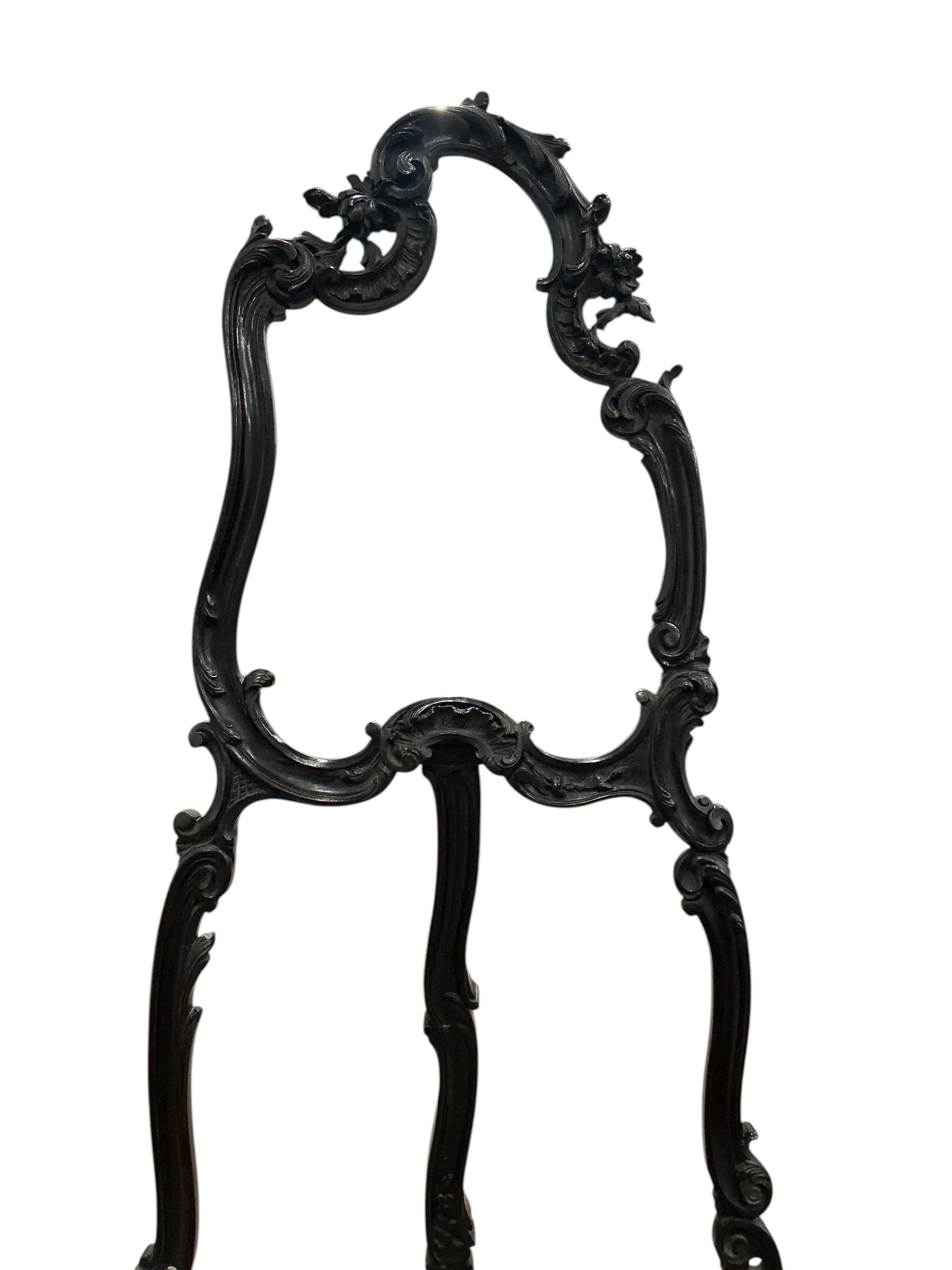 A Chippendale Revival mahogany easel, width 76cm, height 180cm